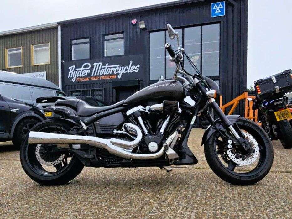 A 2004 YAMAHA XV1700 ROAD STAR WARRIOR WITH COBRA EXHAUST A 2004 YAMAHA XV1700 ROAD STAR WARRIOR WITH COBRA EXHAUST