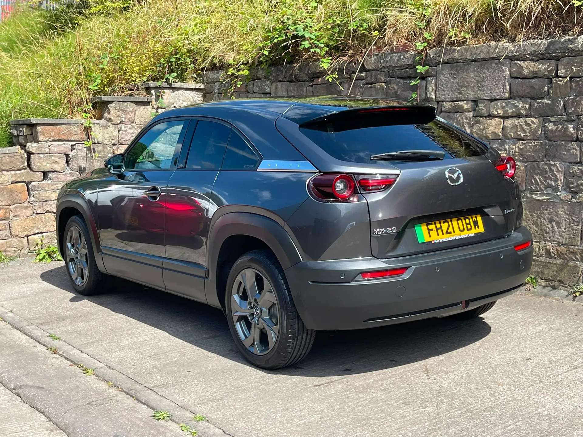 A 2021 MAZDA MX-30 107kW Sport Lux 35.5kWh 5dr Auto âHEATED SEATSâHEAD UP DISPLAYâ A 2021 MAZDA MX-30 107kW Sport Lux 35.5kWh 5dr Auto âHEATED SEATSâHEAD UP DISPLAYâ