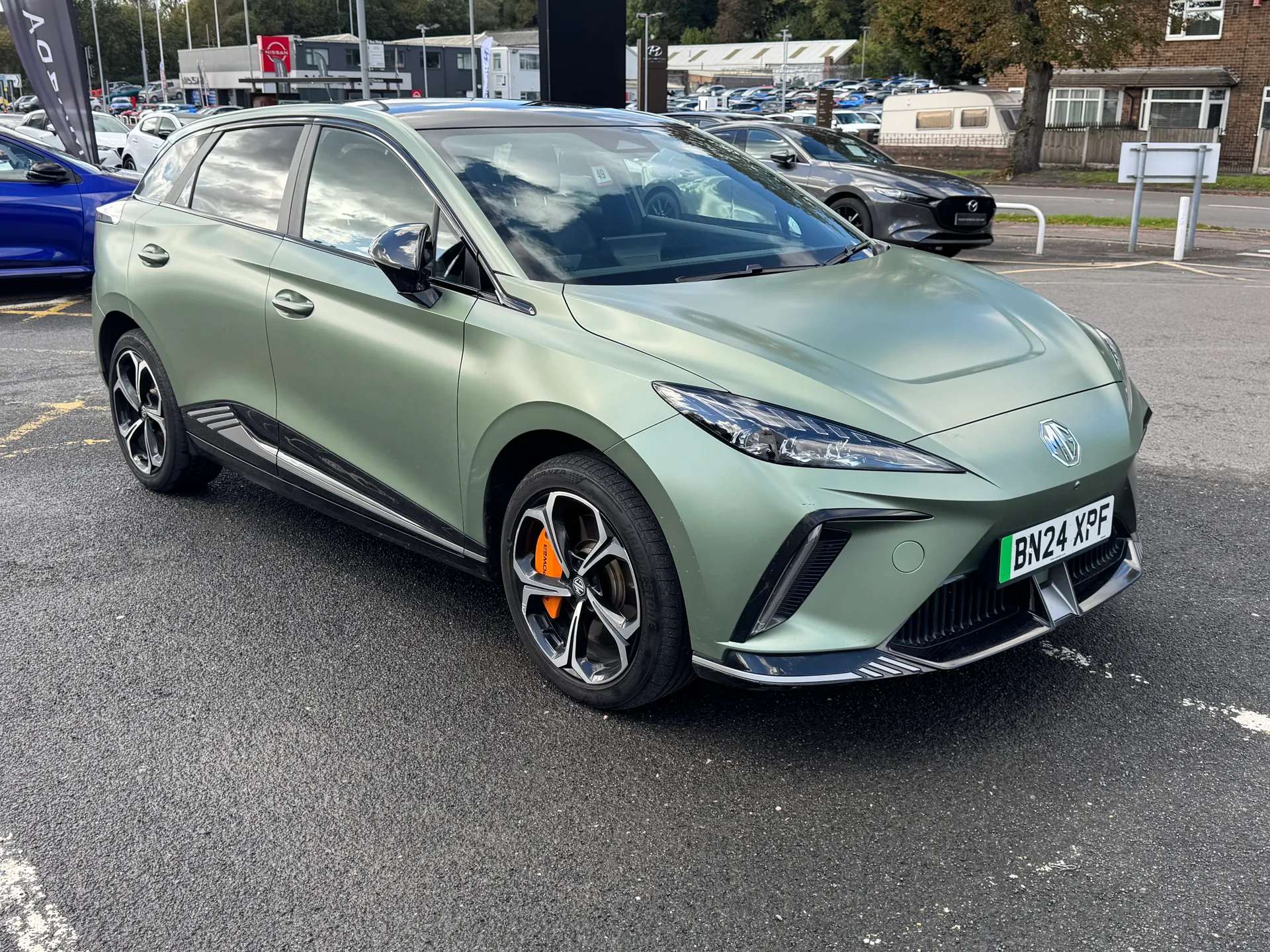 A 2024 MG MG4 320kW EV XPOWER 64kWh 5dr Auto ð Stand-out Matte Green ð A 2024 MG MG4 320kW EV XPOWER 64kWh 5dr Auto ð Stand-out Matte Green ð