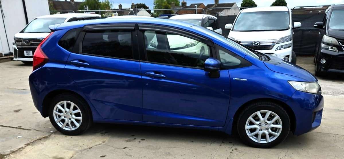 A 2015 HONDA FIT 1.5L HYBRID- ULEZ/CAZ PASS- FREE 24MONTHS GOLD WARRANTY & 12MONTHS AA BREAKDOWN COVER A 2015 HONDA FIT 1.5L HYBRID- ULEZ/CAZ PASS- FREE 24MONTHS GOLD WARRANTY & 12MONTHS AA BREAKDOWN COVER