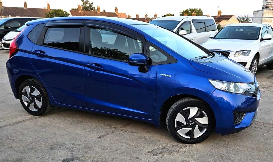 A 2013 HONDA FIT 1.5L HYBRID- ULEZ/CAZ PASS- FREE 18MONTHS GOLD WARRANTY & 12MONTHS AA BREAKDOWN COVER A 2013 HONDA FIT 1.5L HYBRID- ULEZ/CAZ PASS- FREE 18MONTHS GOLD WARRANTY & 12MONTHS AA BREAKDOWN COVER