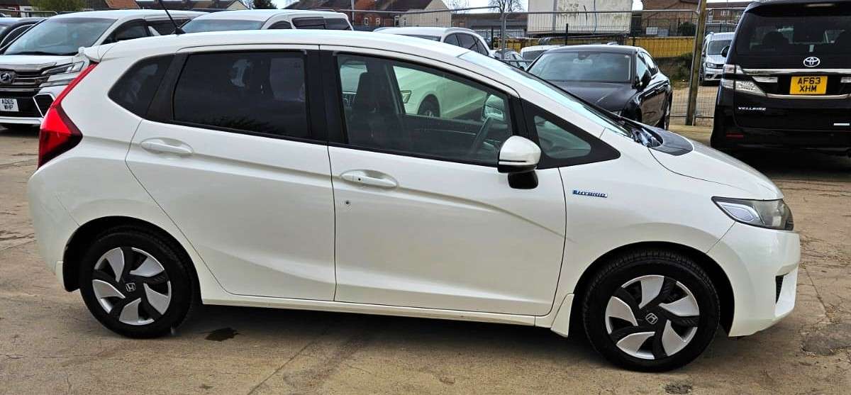 A 2014 HONDA FIT 1.5L HYBRID- ULEZ/CAZ PASS- FREE 18MONTHS GOLD WARRANTY & 12MONTHS AA BREAKDOWN COVER A 2014 HONDA FIT 1.5L HYBRID- ULEZ/CAZ PASS- FREE 18MONTHS GOLD WARRANTY & 12MONTHS AA BREAKDOWN COVER