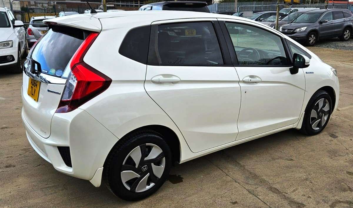 A 2014 HONDA FIT 1.5L HYBRID- ULEZ/CAZ PASS- FREE 18MONTHS GOLD WARRANTY & 12MONTHS AA BREAKDOWN COVER A 2014 HONDA FIT 1.5L HYBRID- ULEZ/CAZ PASS- FREE 18MONTHS GOLD WARRANTY & 12MONTHS AA BREAKDOWN COVER