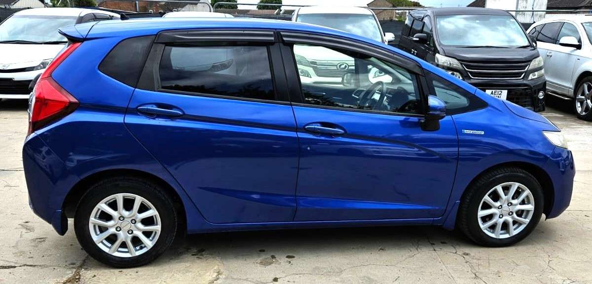 A 2015 HONDA FIT 1.5L HYBRID- ULEZ/CAZ PASS- FREE 24MONTHS GOLD WARRANTY & 12MONTHS AA BREAKDOWN COVER A 2015 HONDA FIT 1.5L HYBRID- ULEZ/CAZ PASS- FREE 24MONTHS GOLD WARRANTY & 12MONTHS AA BREAKDOWN COVER