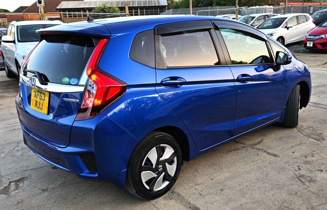 A 2013 HONDA FIT 1.5L HYBRID- ULEZ/CAZ PASS- FREE 18MONTHS GOLD WARRANTY & 12MONTHS AA BREAKDOWN COVER A 2013 HONDA FIT 1.5L HYBRID- ULEZ/CAZ PASS- FREE 18MONTHS GOLD WARRANTY & 12MONTHS AA BREAKDOWN COVER