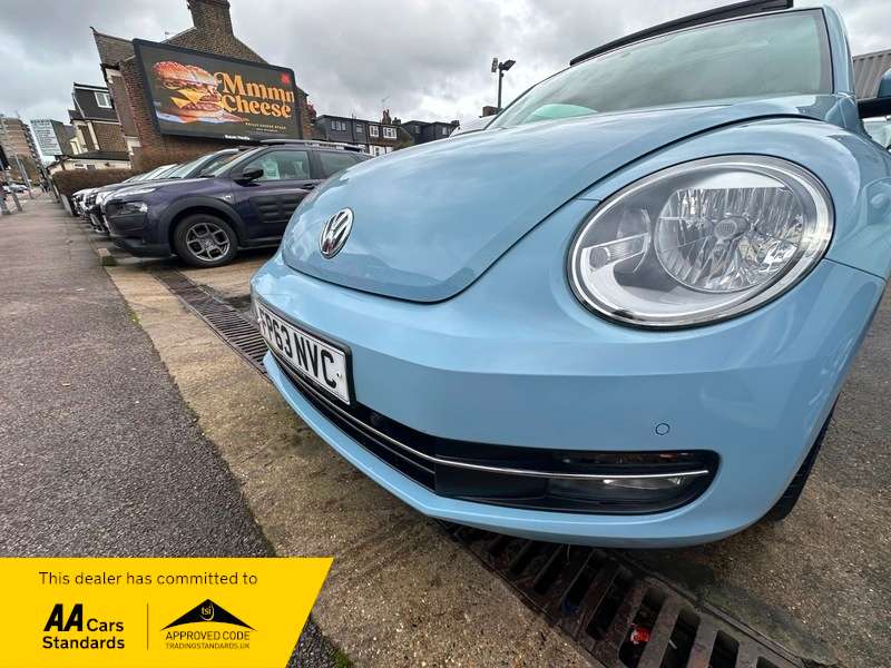 A 0 VOLKSWAGEN BEETLE DESIGN TSI A 0 VOLKSWAGEN BEETLE DESIGN TSI