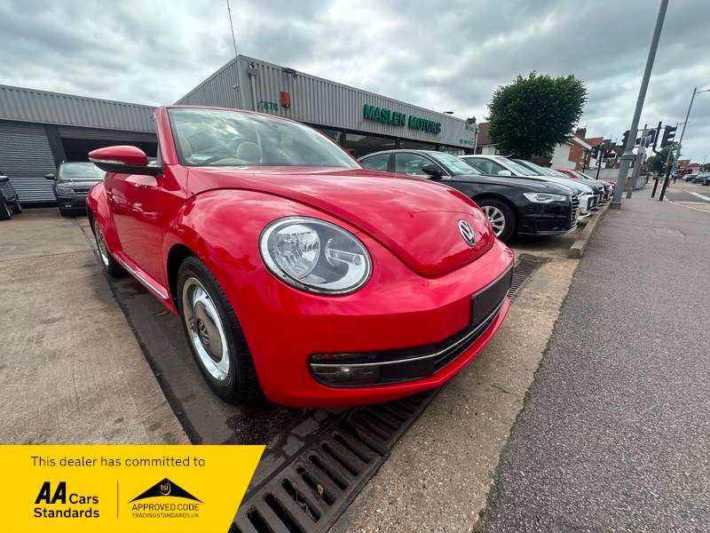 A 2015 VOLKSWAGEN BEETLE DESIGN TSI BLUEMOTION CONVERTIBLE A 2015 VOLKSWAGEN BEETLE DESIGN TSI BLUEMOTION CONVERTIBLE