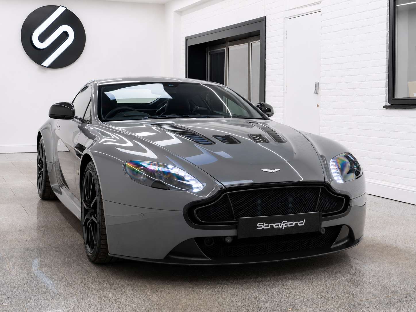 A 2015 ASTON MARTIN VANTAGE 6.0 V12 S Coupe 2dr Petrol Sportshift Euro 6 (565 bhp) A 2015 ASTON MARTIN VANTAGE 6.0 V12 S Coupe 2dr Petrol Sportshift Euro 6 (565 bhp)