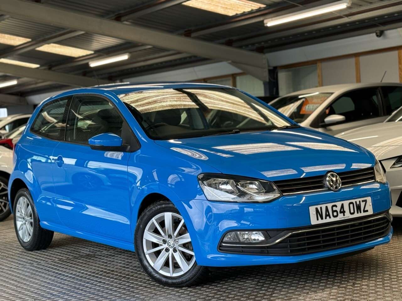 A 2014 VOLKSWAGEN POLO 1.2 TSI BlueMotion Tech SE Hatchback 3dr Petrol Manual Euro 6 (s/s) (90 ps) A 2014 VOLKSWAGEN POLO 1.2 TSI BlueMotion Tech SE Hatchback 3dr Petrol Manual Euro 6 (s/s) (90 ps)