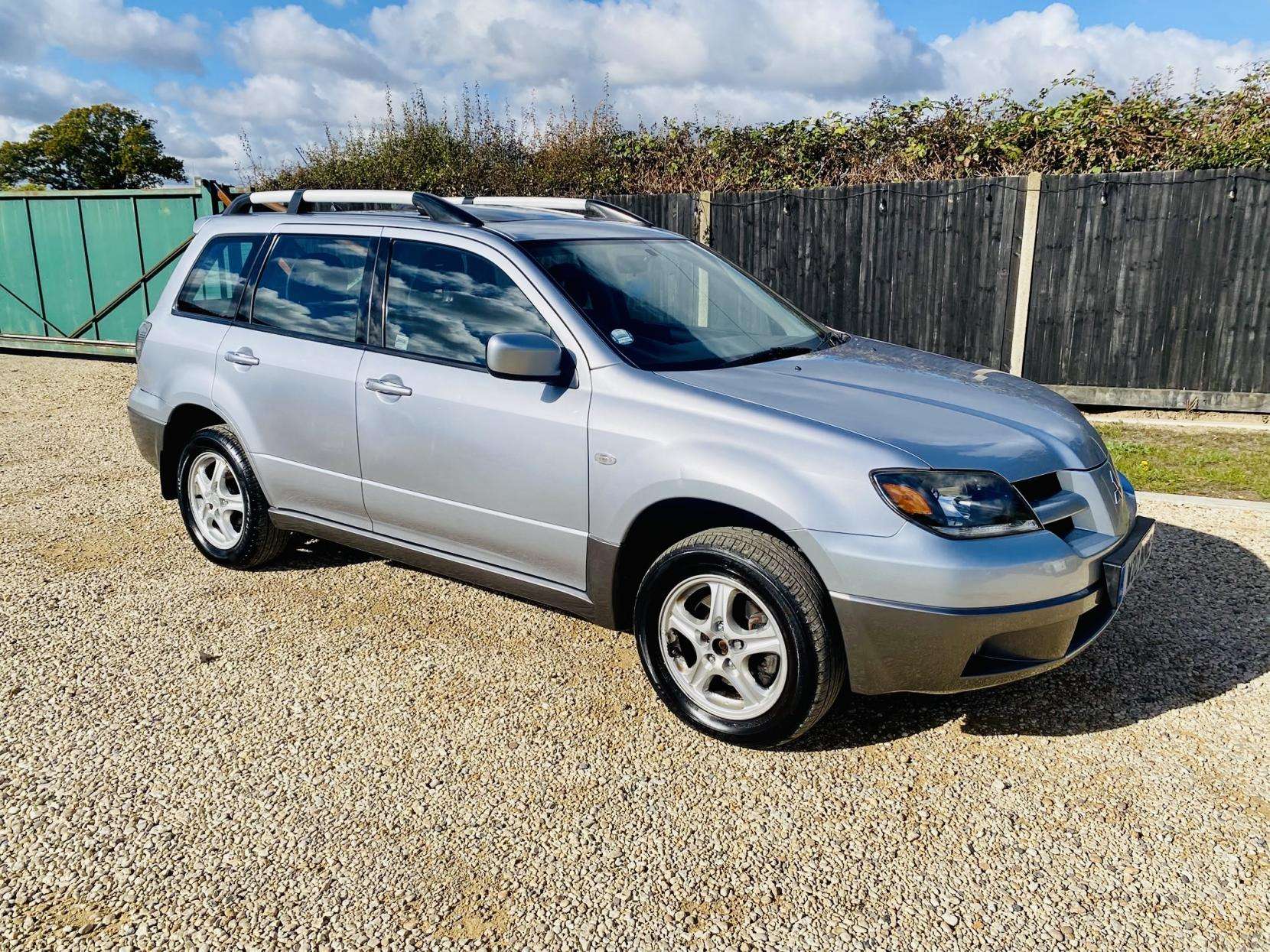 A 2004 MITSUBISHI OUTLANDER 2.4 Sport SE SUV 5dr Petrol Automatic (240 g/km, 158 bhp) A 2004 MITSUBISHI OUTLANDER 2.4 Sport SE SUV 5dr Petrol Automatic (240 g/km, 158 bhp)