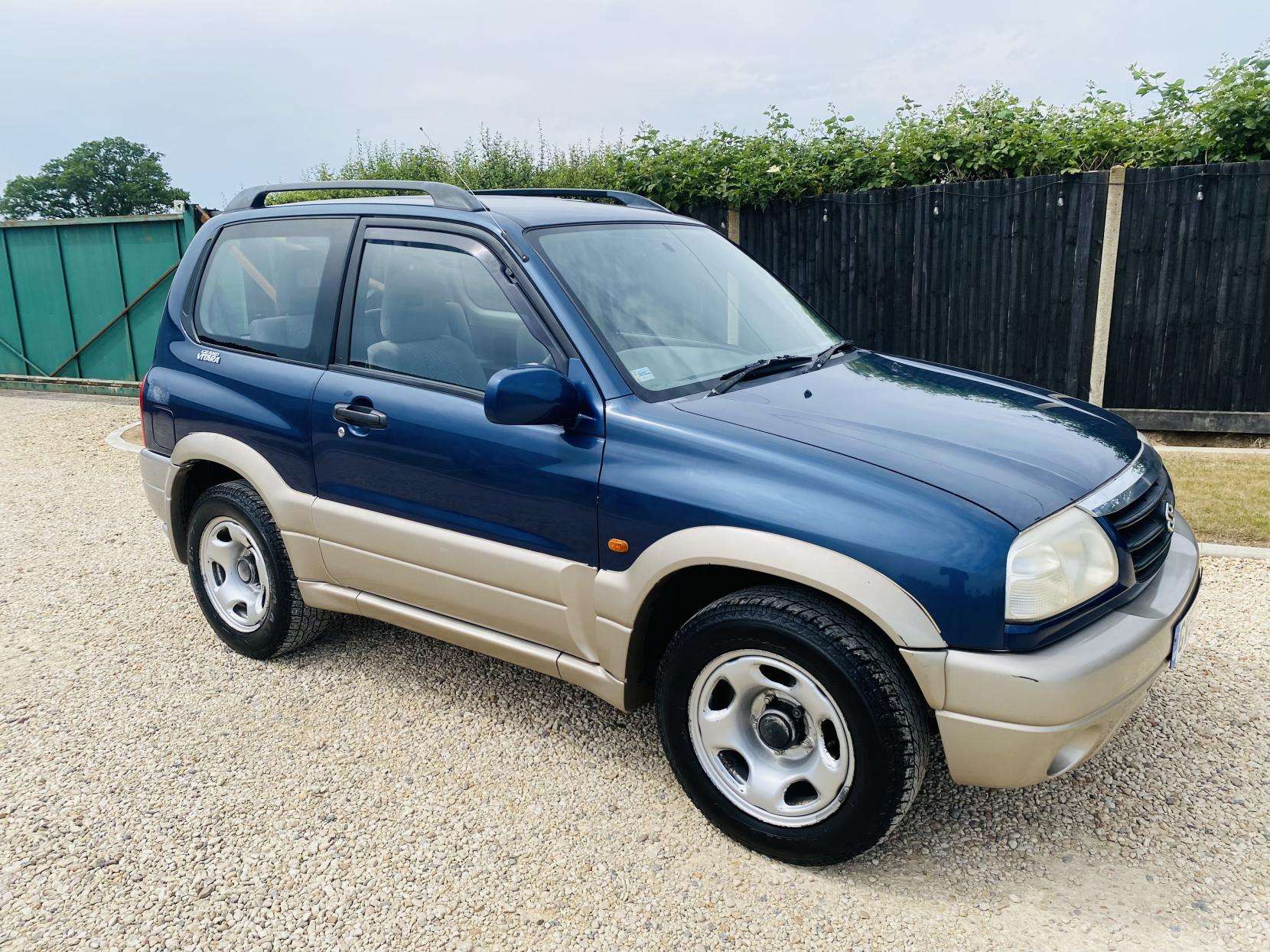A 2002 SUZUKI GRAND VITARA 1.6 SE Estate 3dr Petrol Automatic (220 g/km, 92 bhp) A 2002 SUZUKI GRAND VITARA 1.6 SE Estate 3dr Petrol Automatic (220 g/km, 92 bhp)