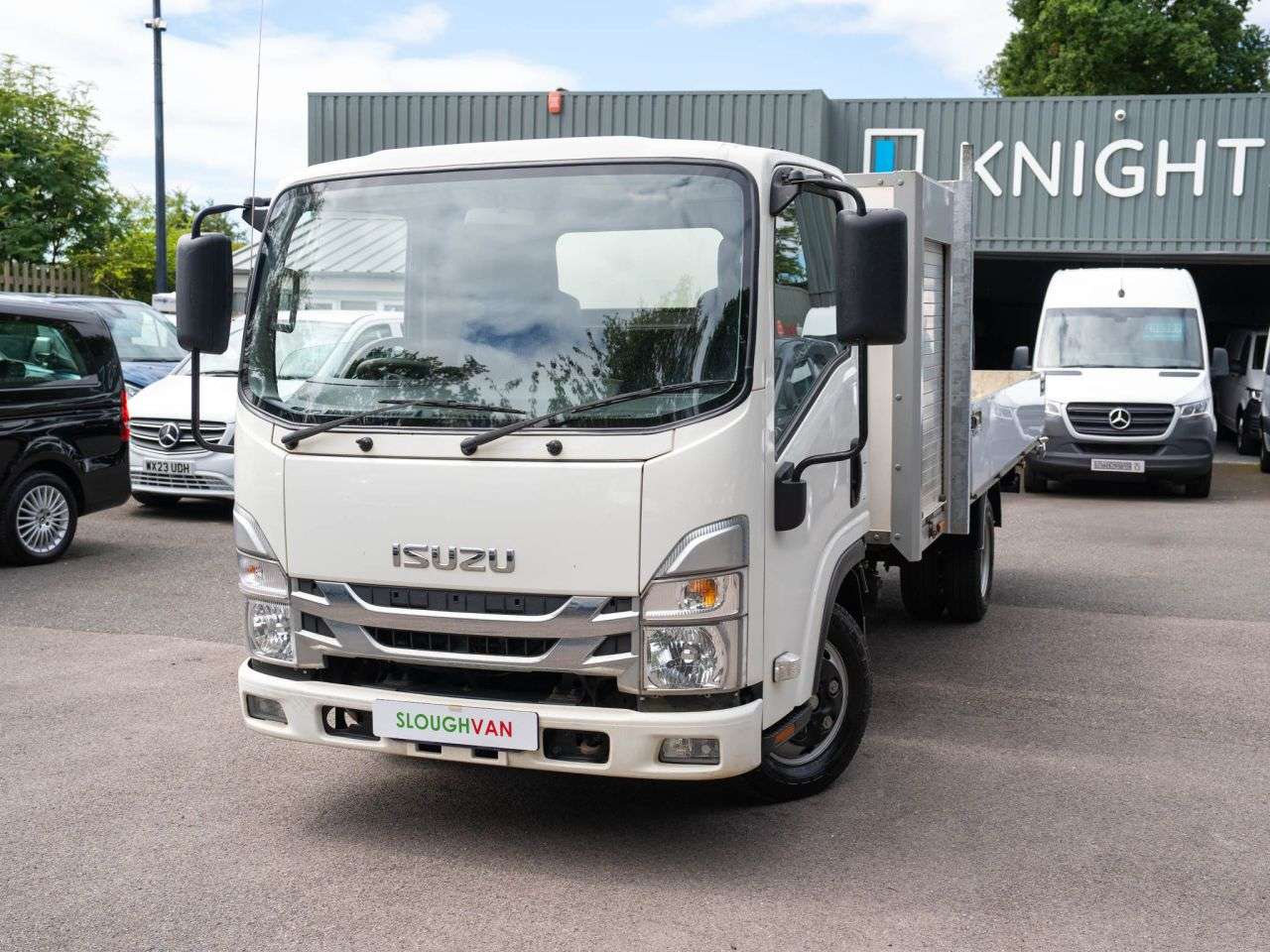 A 2023 ISUZU GRAFTER 1.9D N35 Green Dropside 2dr Diesel Manual RWD SWB Euro 6 (TRW) (125 ps) STO A 2023 ISUZU GRAFTER 1.9D N35 Green Dropside 2dr Diesel Manual RWD SWB Euro 6 (TRW) (125 ps) STO