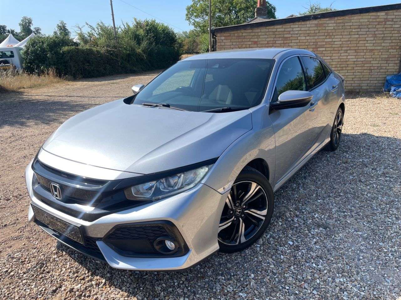 A 2018 HONDA CIVIC 1.0 VTEC Turbo SR Hatchback 5dr Petrol Manual Euro 6 (s/s) (129 ps) NEW WET A 2018 HONDA CIVIC 1.0 VTEC Turbo SR Hatchback 5dr Petrol Manual Euro 6 (s/s) (129 ps) NEW WET