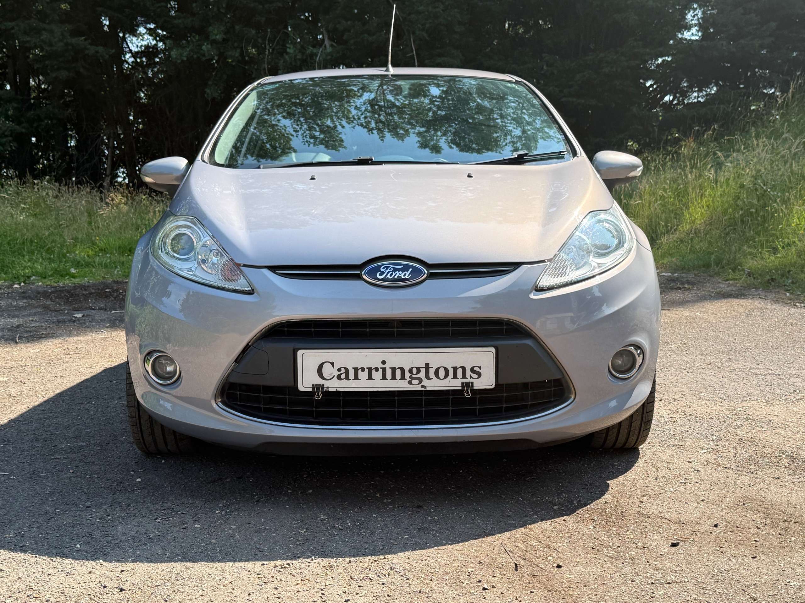 A 2012 FORD FIESTA 1.4 Titanium Hatchback 5dr Petrol Manual (130 g/km, 94 bhp) A 2012 FORD FIESTA 1.4 Titanium Hatchback 5dr Petrol Manual (130 g/km, 94 bhp)