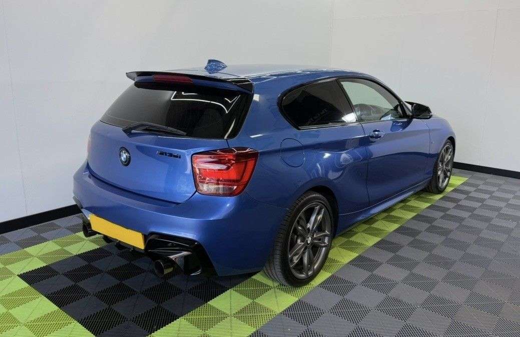 A 2015 BMW 1 SERIES 3.0 M135i Hatchback 3dr Petrol Auto Euro 6 (s/s) (320 ps) A 2015 BMW 1 SERIES 3.0 M135i Hatchback 3dr Petrol Auto Euro 6 (s/s) (320 ps)