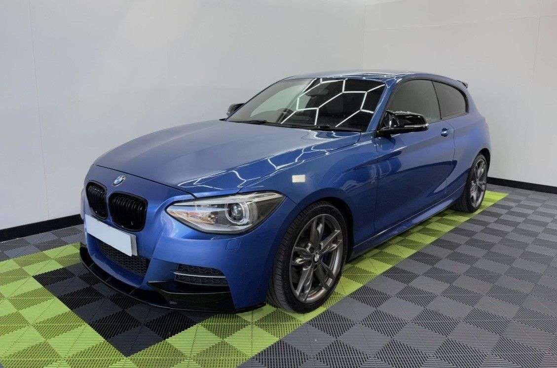 A 2015 BMW 1 SERIES 3.0 M135i Hatchback 3dr Petrol Auto Euro 6 (s/s) (320 ps) A 2015 BMW 1 SERIES 3.0 M135i Hatchback 3dr Petrol Auto Euro 6 (s/s) (320 ps)