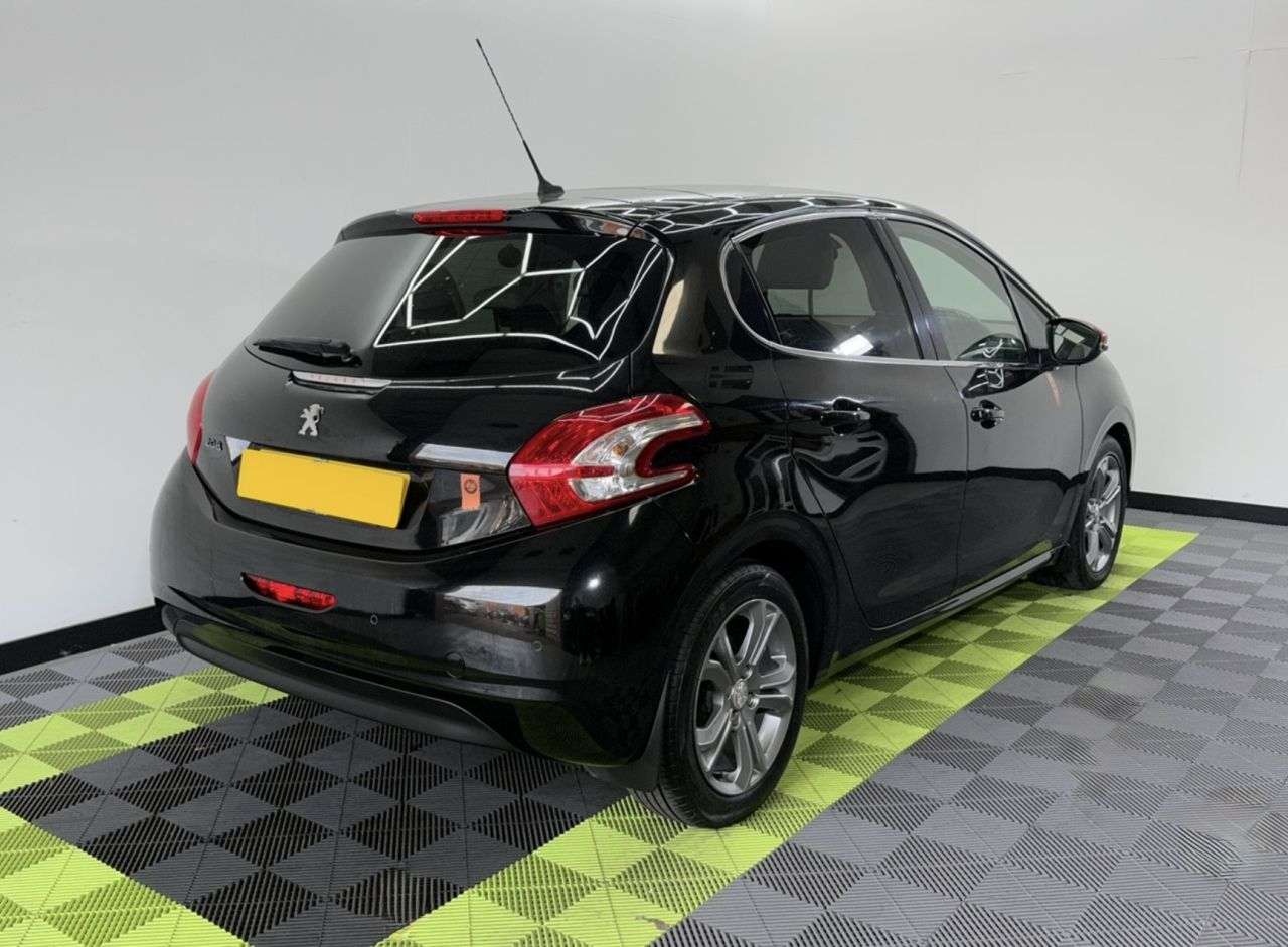 A 2014 PEUGEOT 208 1.2 VTi Roland Garros Hatchback 5dr Petrol Manual Euro 5 (82 ps) A 2014 PEUGEOT 208 1.2 VTi Roland Garros Hatchback 5dr Petrol Manual Euro 5 (82 ps)