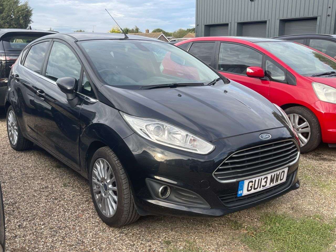 A 2013 FORD FIESTA 1.0 Titanium Hatchback 5dr Petrol Manual Euro 5 (s/s) (80 ps) A 2013 FORD FIESTA 1.0 Titanium Hatchback 5dr Petrol Manual Euro 5 (s/s) (80 ps)