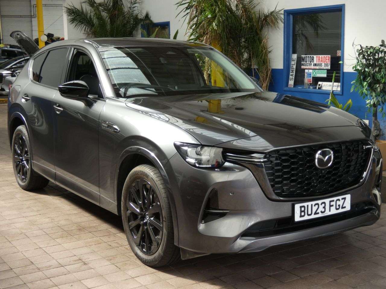 A 2023 MAZDA CX-60 2.5 e-SKYACTIV 17.8kWh Homura SUV 5dr Petrol Plug-in Hybrid Auto 4WD Euro 6 A 2023 MAZDA CX-60 2.5 e-SKYACTIV 17.8kWh Homura SUV 5dr Petrol Plug-in Hybrid Auto 4WD Euro 6