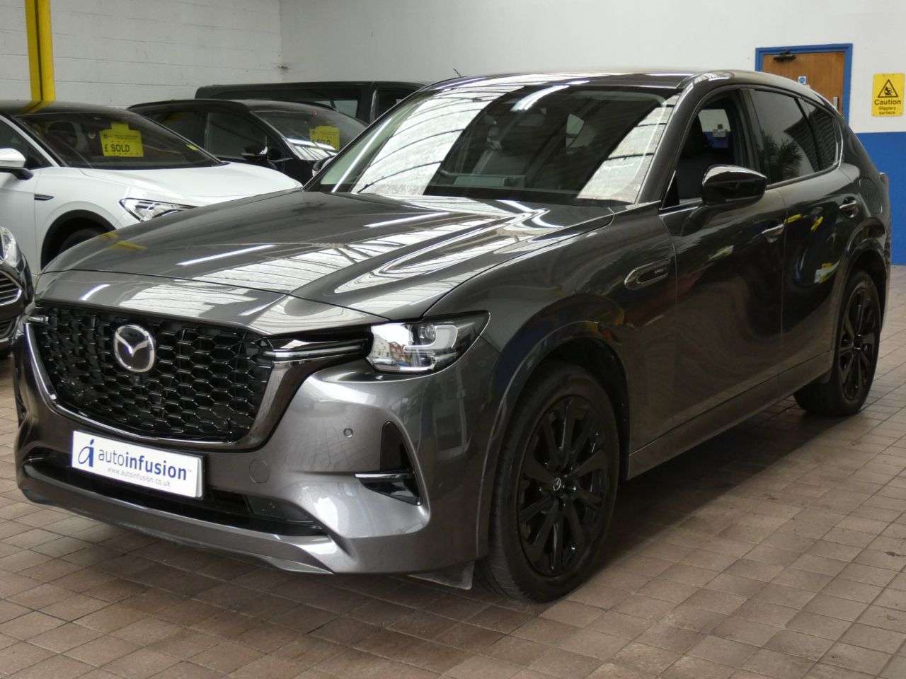 A 2023 MAZDA CX-60 2.5 e-SKYACTIV 17.8kWh Homura SUV 5dr Petrol Plug-in Hybrid Auto 4WD Euro 6 A 2023 MAZDA CX-60 2.5 e-SKYACTIV 17.8kWh Homura SUV 5dr Petrol Plug-in Hybrid Auto 4WD Euro 6