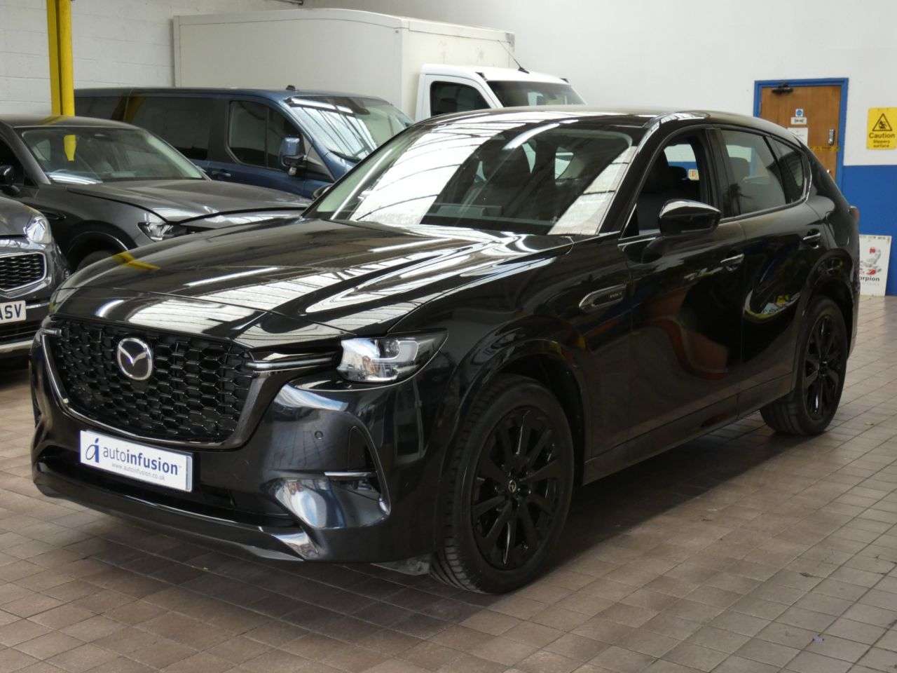 A 2023 MAZDA CX-60 2.5 e-SKYACTIV 17.8kWh Homura SUV 5dr Petrol Plug-in Hybrid Auto 4WD Euro 6 A 2023 MAZDA CX-60 2.5 e-SKYACTIV 17.8kWh Homura SUV 5dr Petrol Plug-in Hybrid Auto 4WD Euro 6