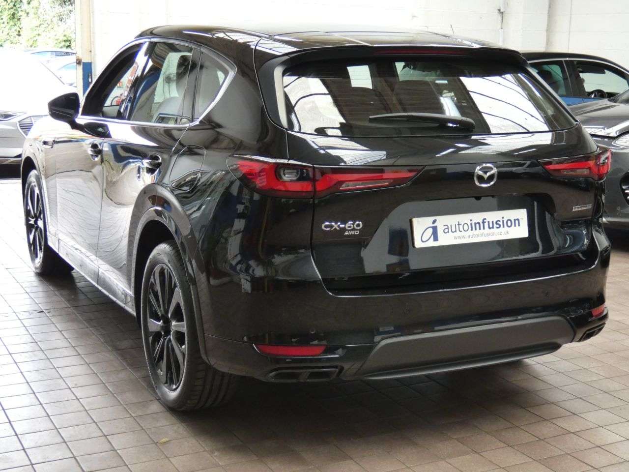 A 2023 MAZDA CX-60 2.5 e-SKYACTIV 17.8kWh Homura SUV 5dr Petrol Plug-in Hybrid Auto 4WD Euro 6 A 2023 MAZDA CX-60 2.5 e-SKYACTIV 17.8kWh Homura SUV 5dr Petrol Plug-in Hybrid Auto 4WD Euro 6