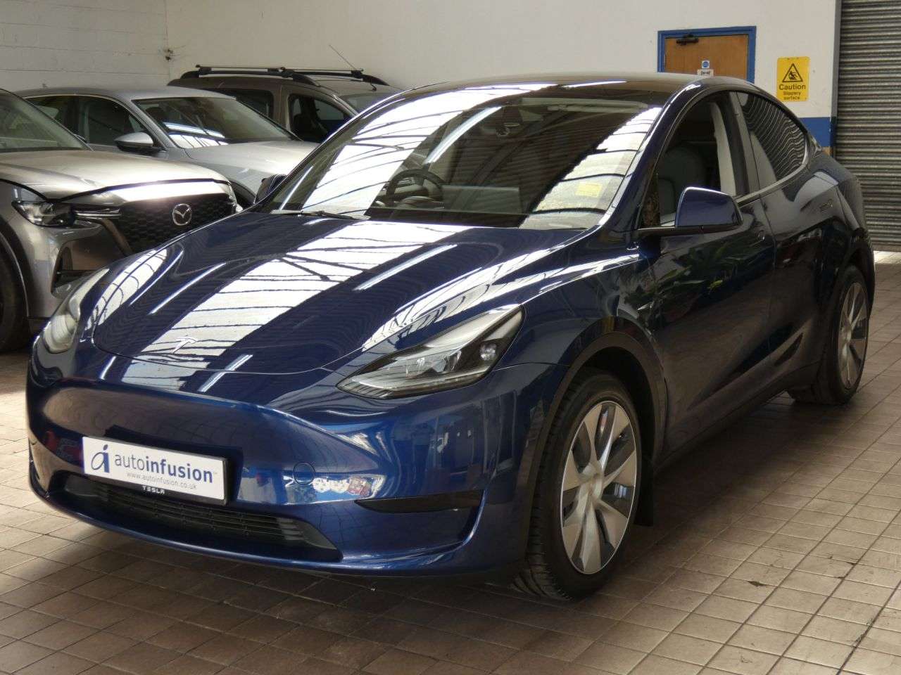 A 2023 TESLA MODEL Y SUV 5dr Electric Auto RWD (346 ps) GENUINE MILES 1 OWNER WARRANTY A 2023 TESLA MODEL Y SUV 5dr Electric Auto RWD (346 ps) GENUINE MILES 1 OWNER WARRANTY