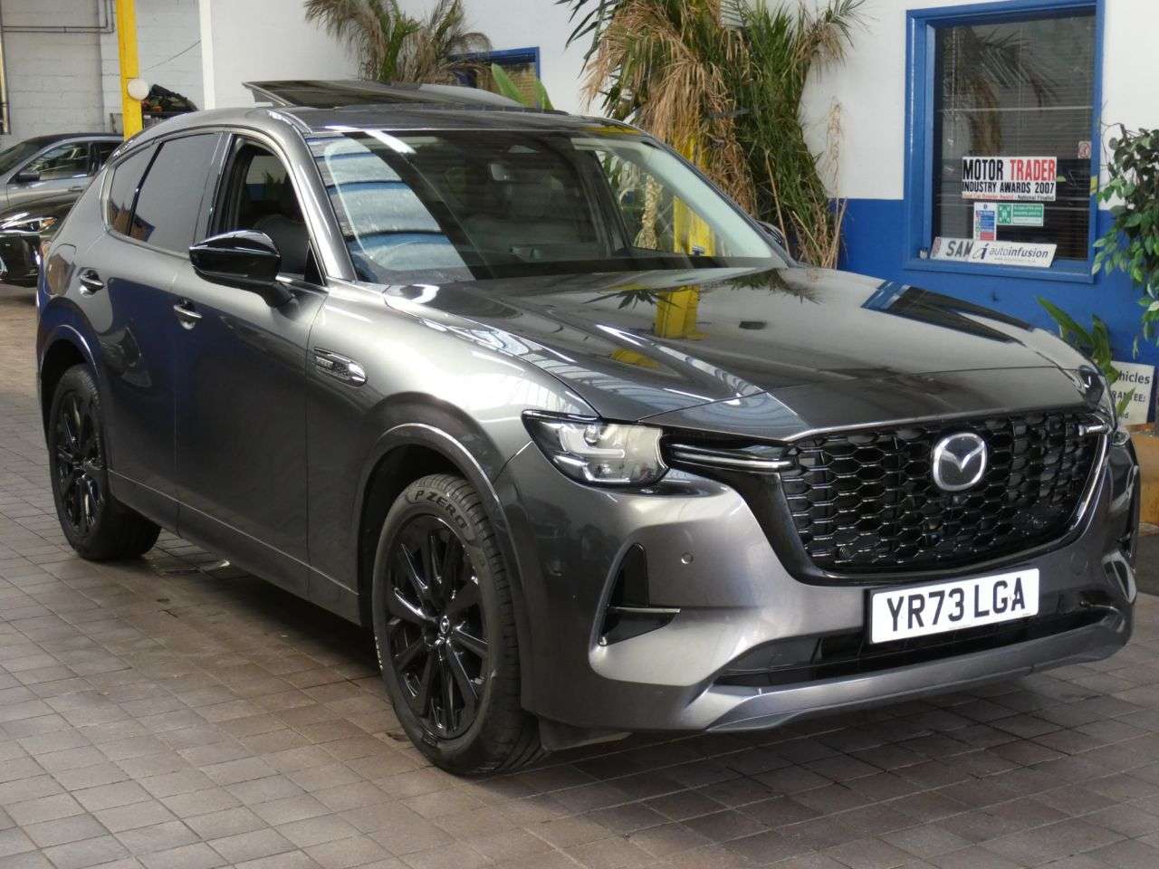 A 2023 MAZDA CX-60 2.5 e-SKYACTIV 17.8kWh Homura SUV 5dr Petrol Plug-in Hybrid Auto 4WD Euro 6 A 2023 MAZDA CX-60 2.5 e-SKYACTIV 17.8kWh Homura SUV 5dr Petrol Plug-in Hybrid Auto 4WD Euro 6