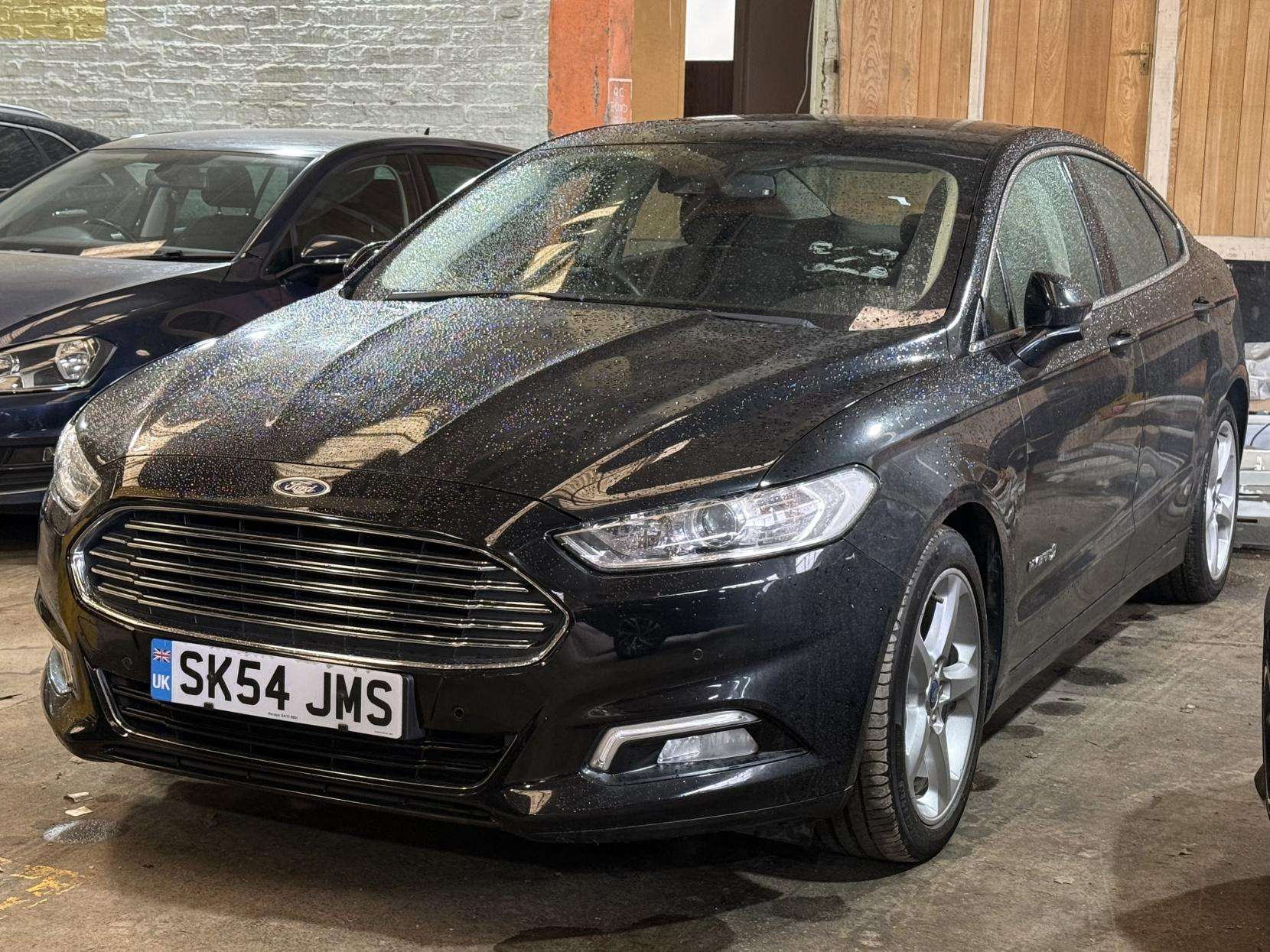A 2016 FORD MONDEO 2.0 TiVCT Titanium Saloon 4dr Petrol Hybrid CVT Euro 6 (s/s) (187 ps) A 2016 FORD MONDEO 2.0 TiVCT Titanium Saloon 4dr Petrol Hybrid CVT Euro 6 (s/s) (187 ps)