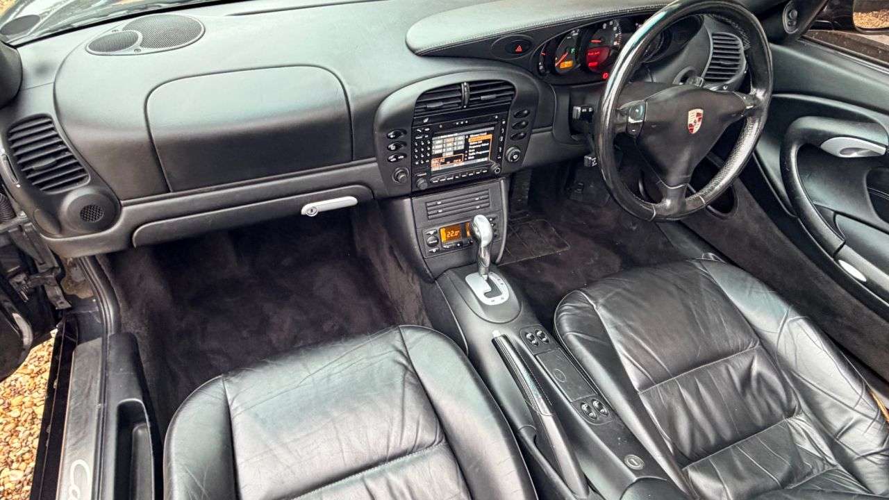 A 2004 PORSCHE 911 3.6 996 Carrera 2 Cabriolet 2dr Petrol Tiptronic S (274 g/km, 315 bhp) A 2004 PORSCHE 911 3.6 996 Carrera 2 Cabriolet 2dr Petrol Tiptronic S (274 g/km, 315 bhp)