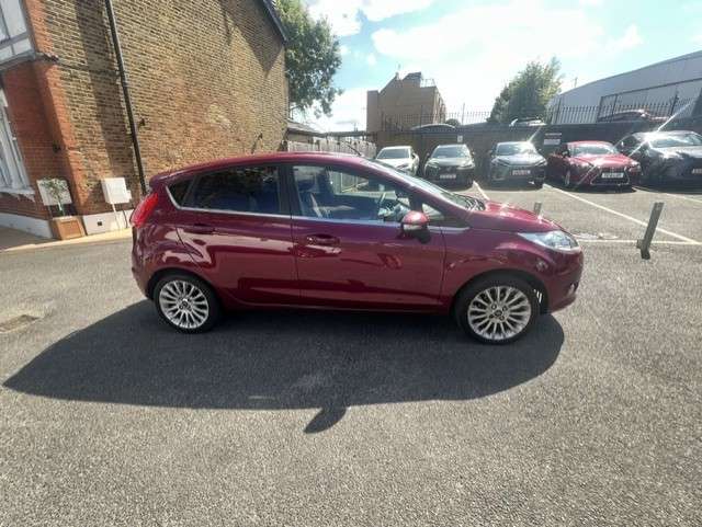 A 2012 FORD FIESTA 1.4 Titanium Hatchback 5dr Petrol Automatic (149 g/km, 94 bhp) A 2012 FORD FIESTA 1.4 Titanium Hatchback 5dr Petrol Automatic (149 g/km, 94 bhp)