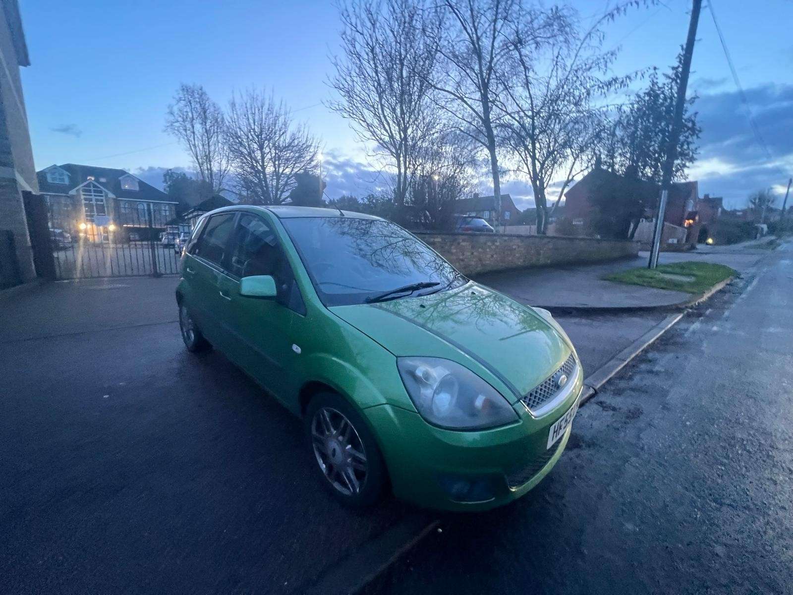 A 2006 FORD FIESTA 1.4 Ghia Hatchback 5dr Petrol Manual (147 g/km, 79 bhp) A 2006 FORD FIESTA 1.4 Ghia Hatchback 5dr Petrol Manual (147 g/km, 79 bhp)