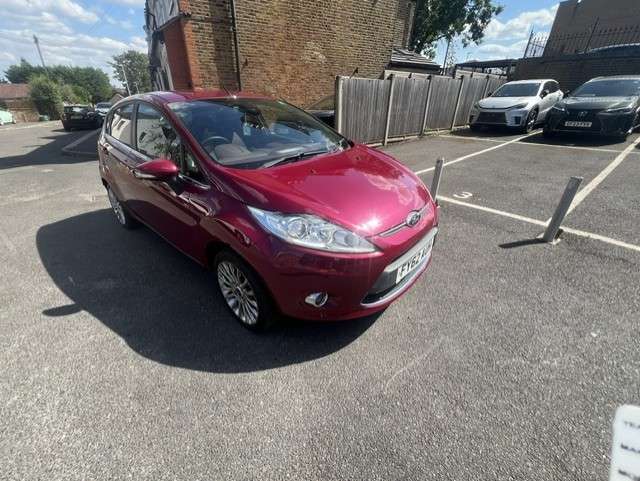 A 2012 FORD FIESTA 1.4 Titanium Hatchback 5dr Petrol Automatic (149 g/km, 94 bhp) A 2012 FORD FIESTA 1.4 Titanium Hatchback 5dr Petrol Automatic (149 g/km, 94 bhp)