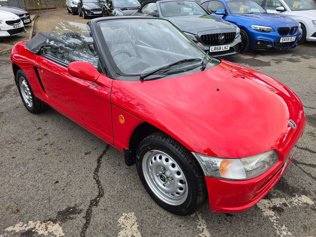 A 1998 HONDA BEAT Beat in red with CLASSIC CAR 111,000 miles, service history. Features 5-spe A 1998 HONDA BEAT Beat in red with CLASSIC CAR 111,000 miles, service history. Features 5-spe