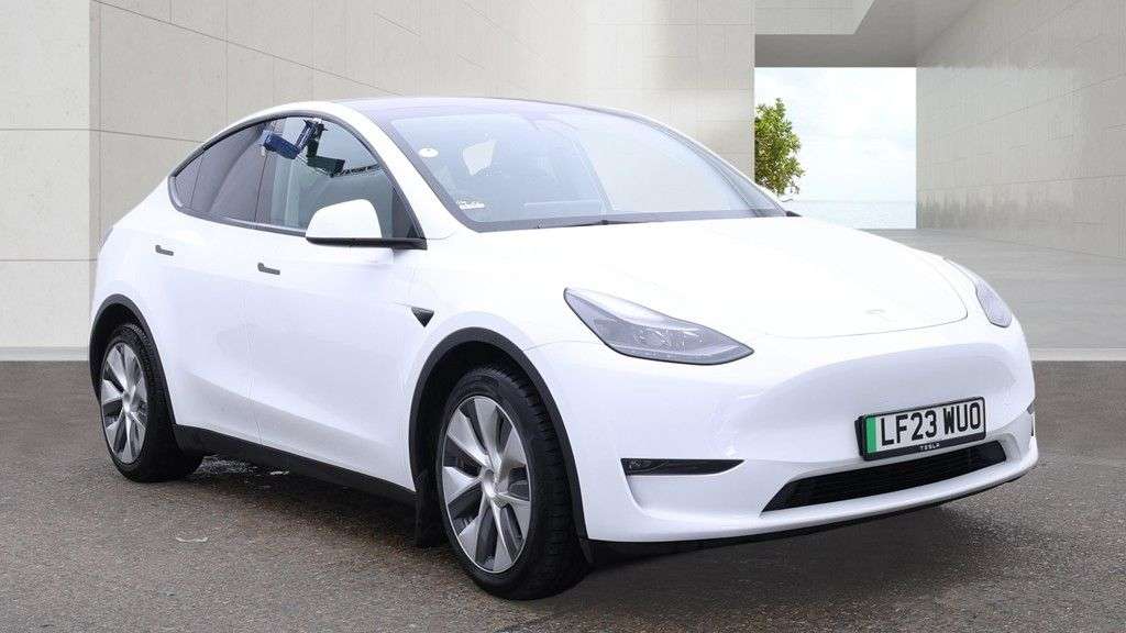 A 2023 TESLA MODEL Y White Dual Motor Long Range SUV, 66,808 miles, Electric 4WD, Leather, Heate A 2023 TESLA MODEL Y White Dual Motor Long Range SUV, 66,808 miles, Electric 4WD, Leather, Heate