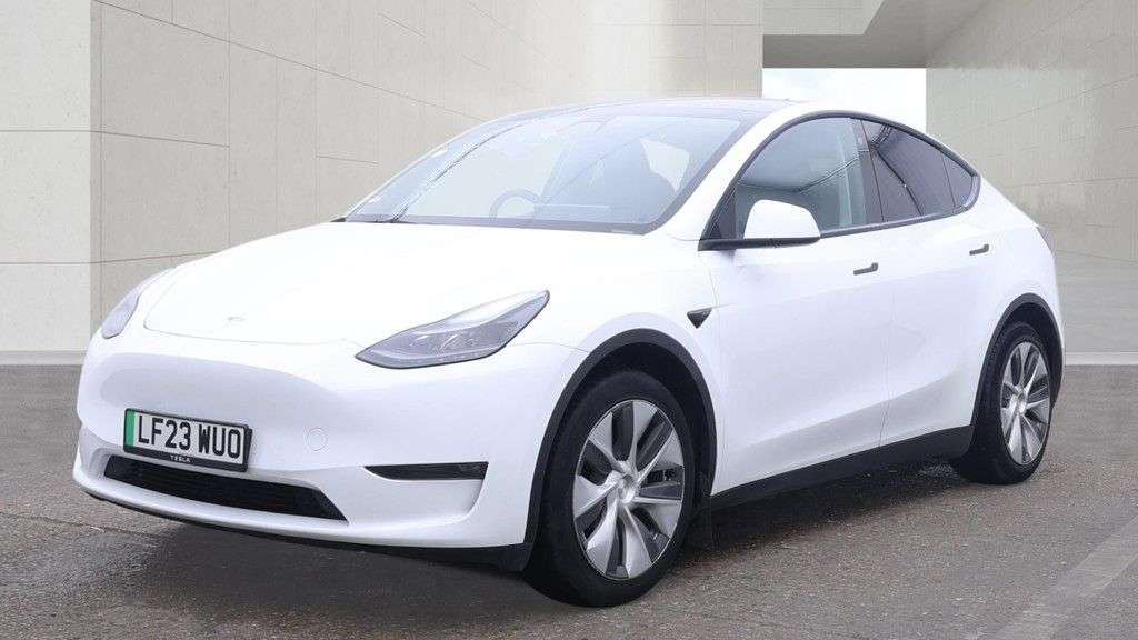 A 2023 TESLA MODEL Y White Dual Motor Long Range SUV, 66,808 miles, Electric 4WD, Leather, Heate A 2023 TESLA MODEL Y White Dual Motor Long Range SUV, 66,808 miles, Electric 4WD, Leather, Heate