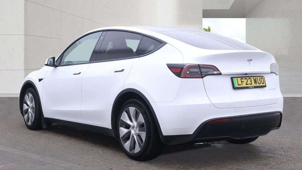 A 2023 TESLA MODEL Y White Dual Motor Long Range SUV, 66,808 miles, Electric 4WD, Leather, Heate A 2023 TESLA MODEL Y White Dual Motor Long Range SUV, 66,808 miles, Electric 4WD, Leather, Heate
