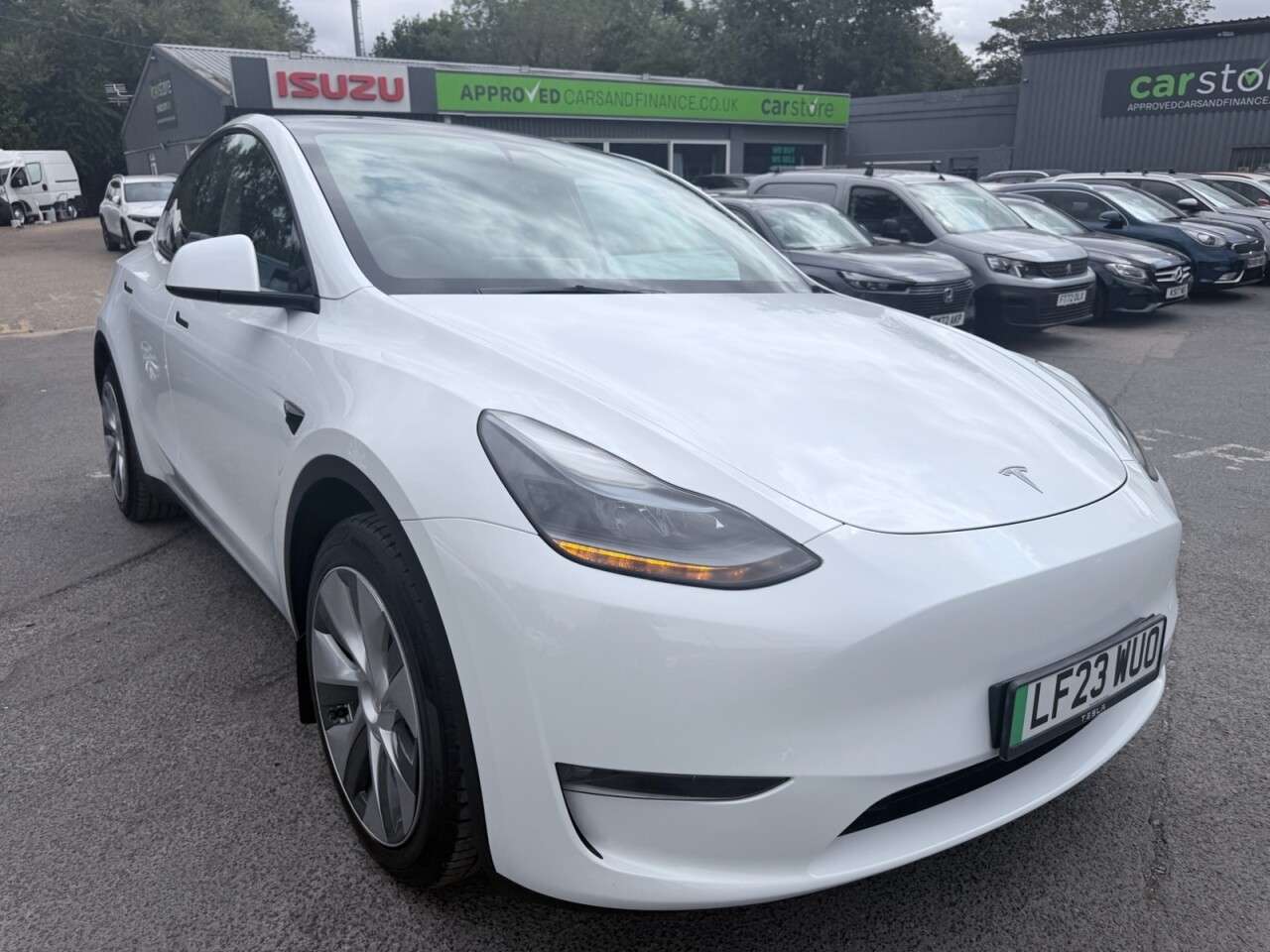 A 2023 TESLA MODEL Y White Dual Motor Long Range SUV, 66,808 miles, Electric 4WD, Leather, Heate A 2023 TESLA MODEL Y White Dual Motor Long Range SUV, 66,808 miles, Electric 4WD, Leather, Heate
