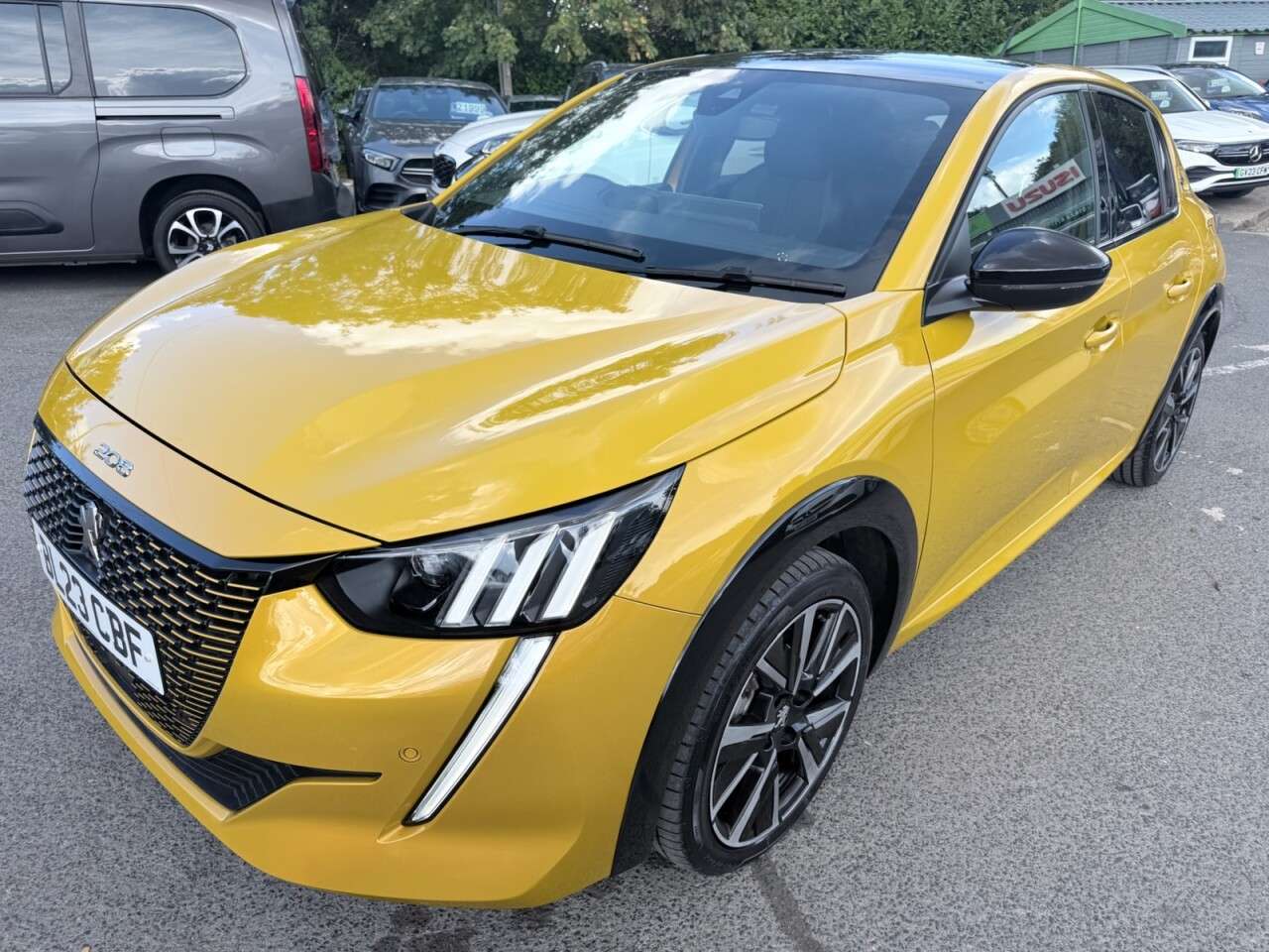 A 2023 PEUGEOT E-208 Yellow 50kWh GT EV, 10,250 miles, Automatic, Half leather, Rear camera, Sat A 2023 PEUGEOT E-208 Yellow 50kWh GT EV, 10,250 miles, Automatic, Half leather, Rear camera, Sat