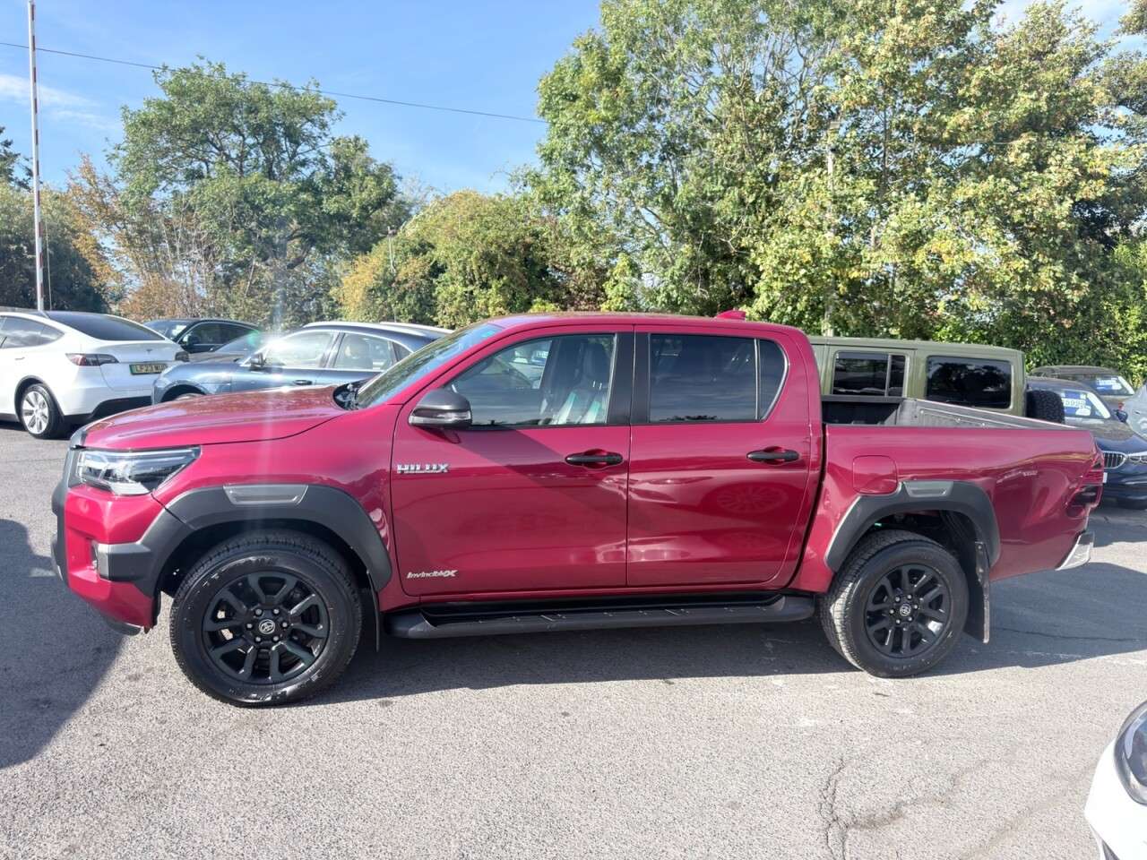 A 2022 TOYOTA HILUX Red 2.8 D-4D Invincible X Pickup, 44,750 miles, Euro 6, 6-Speed manual 4WD, A 2022 TOYOTA HILUX Red 2.8 D-4D Invincible X Pickup, 44,750 miles, Euro 6, 6-Speed manual 4WD,