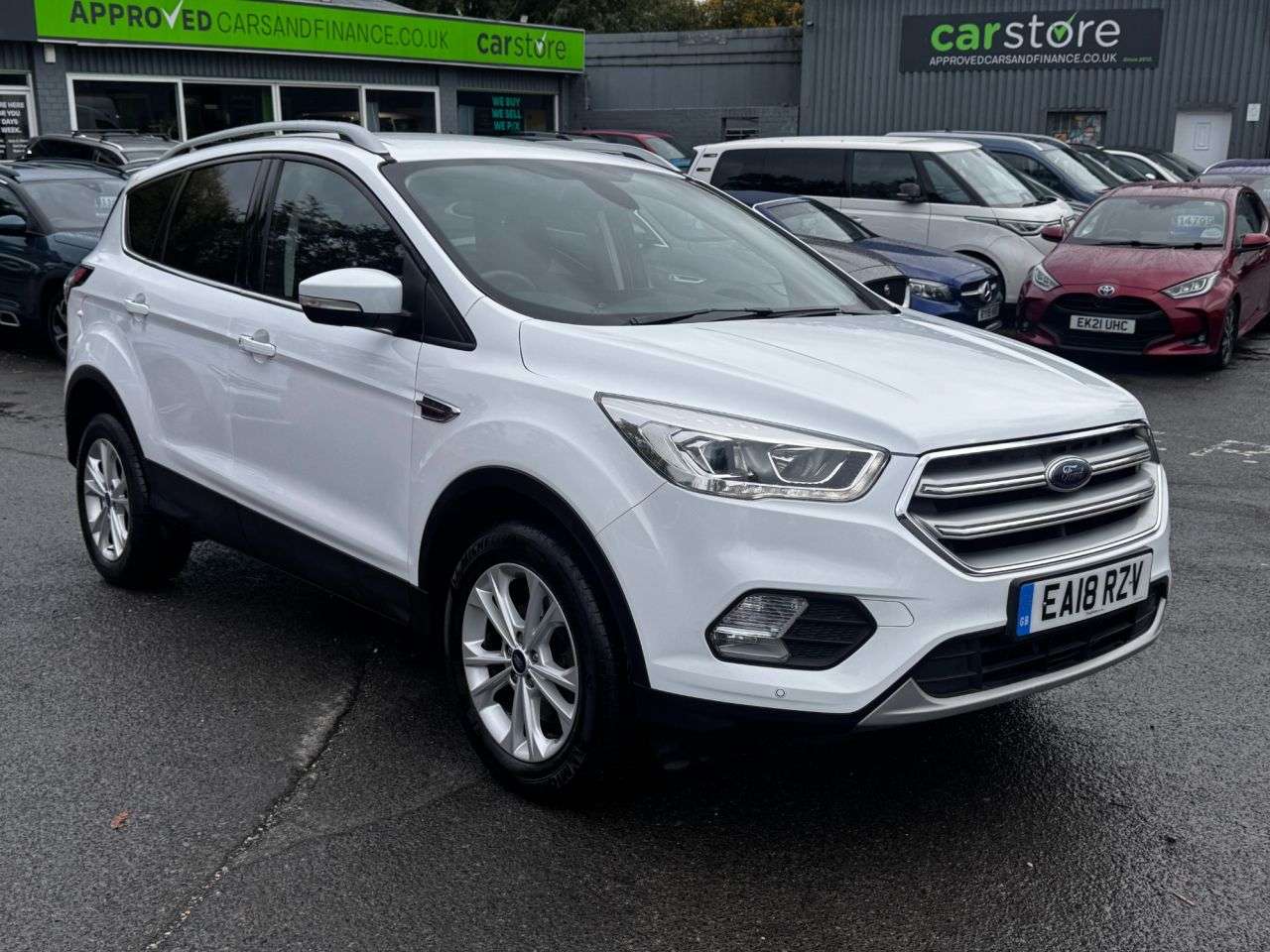 A 2018 FORD KUGA 2.0 TDCi Titanium SUV 5dr Diesel Manual Euro 6 (s/s) (150 ps) in white with A 2018 FORD KUGA 2.0 TDCi Titanium SUV 5dr Diesel Manual Euro 6 (s/s) (150 ps) in white with