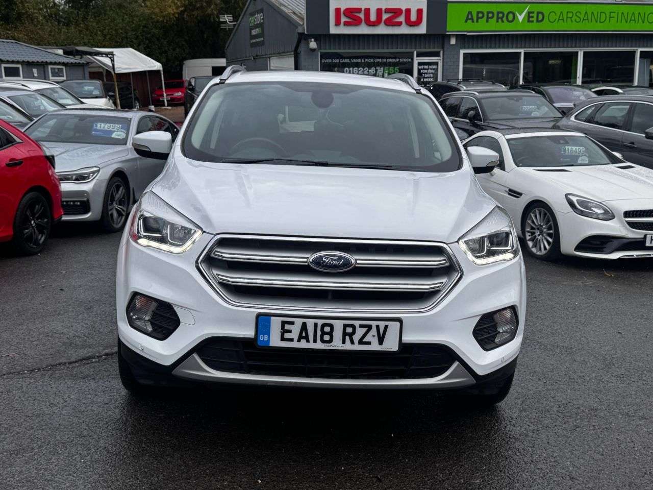 A 2018 FORD KUGA 2.0 TDCi Titanium SUV 5dr Diesel Manual Euro 6 (s/s) (150 ps) in white with A 2018 FORD KUGA 2.0 TDCi Titanium SUV 5dr Diesel Manual Euro 6 (s/s) (150 ps) in white with