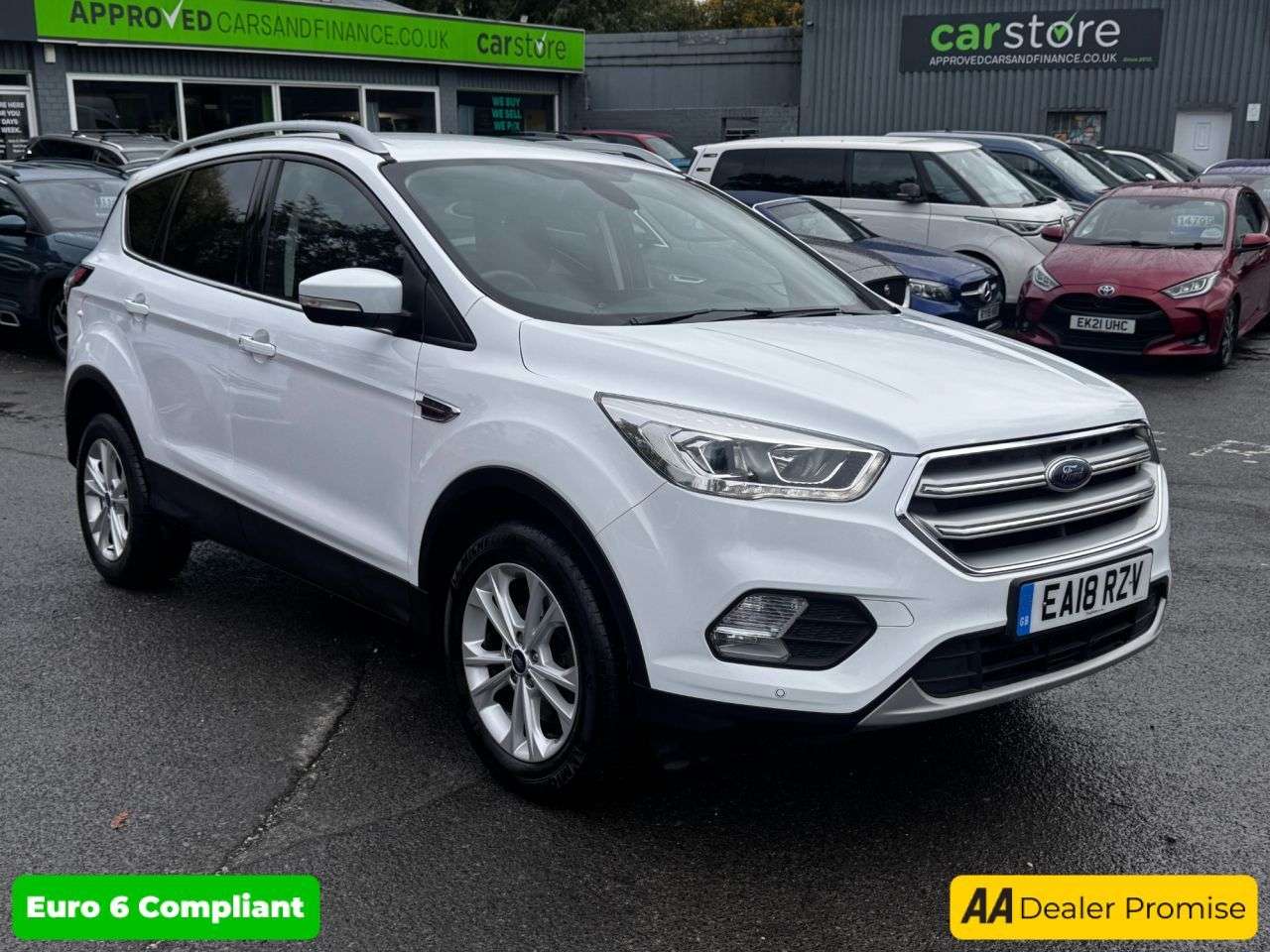 A 2018 FORD KUGA 2.0 TDCi Titanium SUV 5dr Diesel Manual Euro 6 (s/s) (150 ps) in white with A 2018 FORD KUGA 2.0 TDCi Titanium SUV 5dr Diesel Manual Euro 6 (s/s) (150 ps) in white with