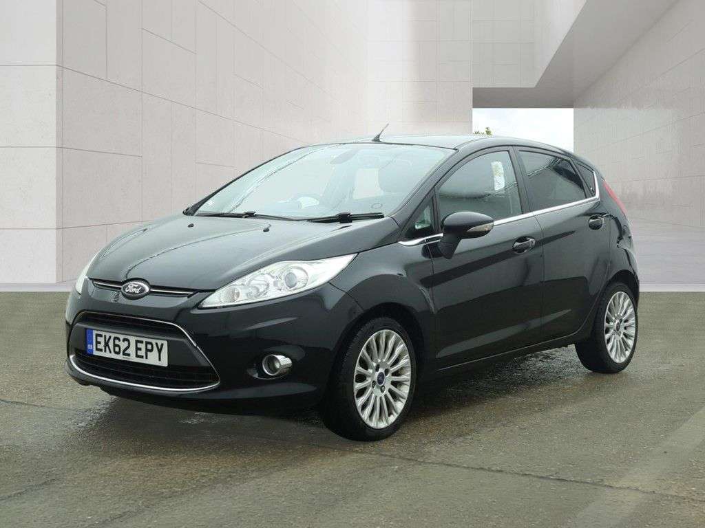 A 2012 FORD FIESTA 1.4 Titanium Hatchback 5dr Petrol Manual (130 g/km, 94 bhp) AIR CON, ALLOYS A 2012 FORD FIESTA 1.4 Titanium Hatchback 5dr Petrol Manual (130 g/km, 94 bhp) AIR CON, ALLOYS