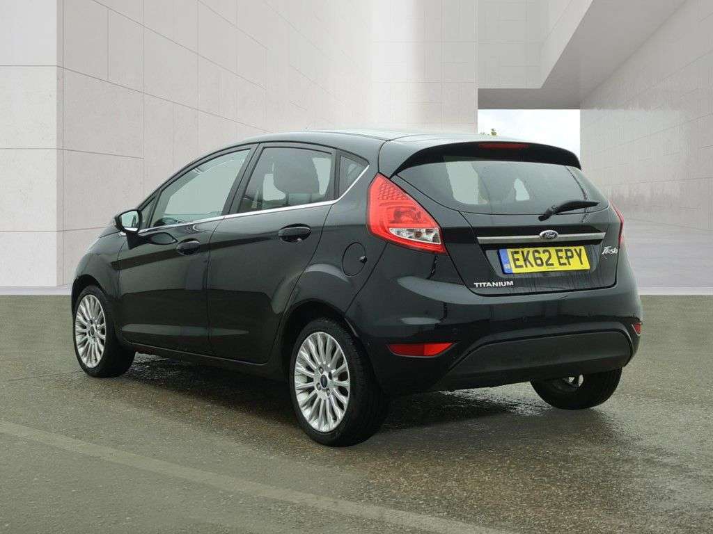 A 2012 FORD FIESTA 1.4 Titanium Hatchback 5dr Petrol Manual (130 g/km, 94 bhp) AIR CON, ALLOYS A 2012 FORD FIESTA 1.4 Titanium Hatchback 5dr Petrol Manual (130 g/km, 94 bhp) AIR CON, ALLOYS
