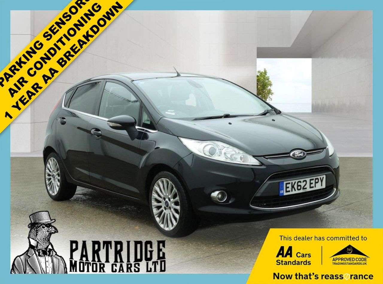 A 2012 FORD FIESTA 1.4 Titanium Hatchback 5dr Petrol Manual (130 g/km, 94 bhp) AIR CON, ALLOYS A 2012 FORD FIESTA 1.4 Titanium Hatchback 5dr Petrol Manual (130 g/km, 94 bhp) AIR CON, ALLOYS