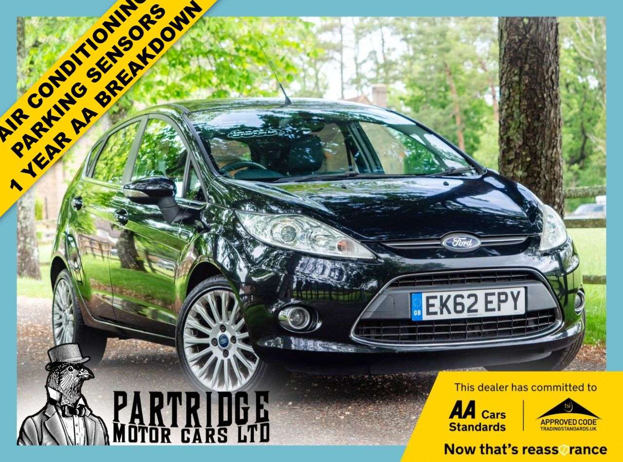 A 2012 FORD FIESTA 1.4 Titanium Hatchback 5dr Petrol Manual (130 g/km, 94 bhp) AIR CON, ALLOYS A 2012 FORD FIESTA 1.4 Titanium Hatchback 5dr Petrol Manual (130 g/km, 94 bhp) AIR CON, ALLOYS