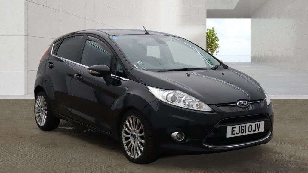 A 2011 FORD FIESTA 1.4 TDCi DPF Titanium Hatchback 5dr Diesel Manual (107 g/km, 69 bhp) A 2011 FORD FIESTA 1.4 TDCi DPF Titanium Hatchback 5dr Diesel Manual (107 g/km, 69 bhp)