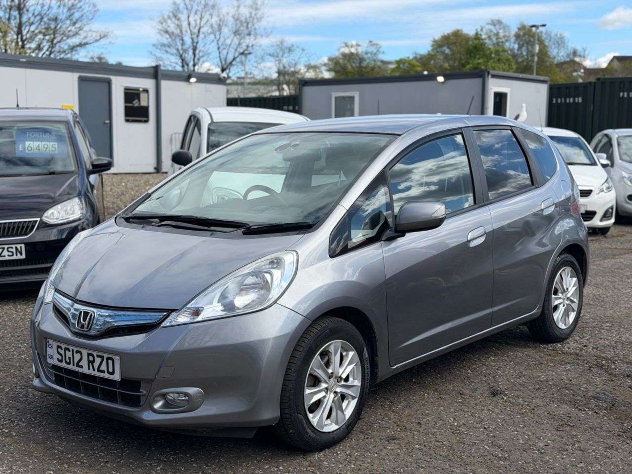 A 2012 HONDA JAZZ 1.3h IMA HS Hatchback 5dr Petrol Hybrid CVT Euro 5 (102 ps) A 2012 HONDA JAZZ 1.3h IMA HS Hatchback 5dr Petrol Hybrid CVT Euro 5 (102 ps)
