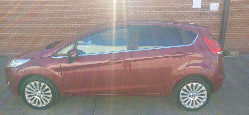 A 2010 FORD FIESTA 1.4 Titanium Hatchback 5dr Petrol Manual (133 g/km, 94 bhp) A 2010 FORD FIESTA 1.4 Titanium Hatchback 5dr Petrol Manual (133 g/km, 94 bhp)